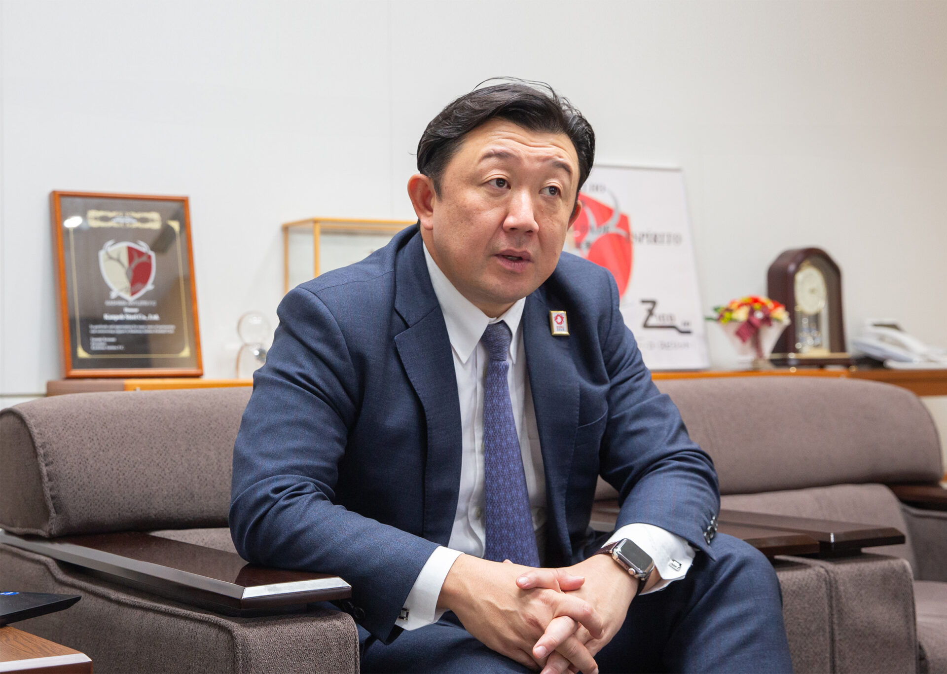インタビューに応じる谷本様